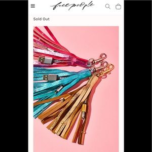 Free people leather iPhone charger keychain.‎ New.